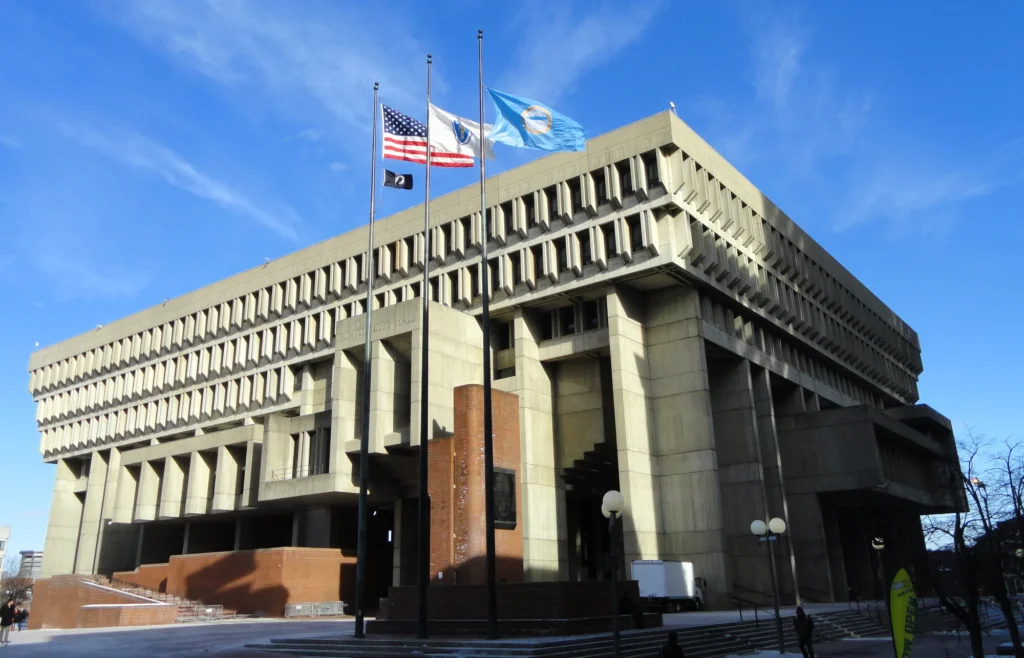 Boston City Hall's projecting concrete office floors and brick-paved plaza